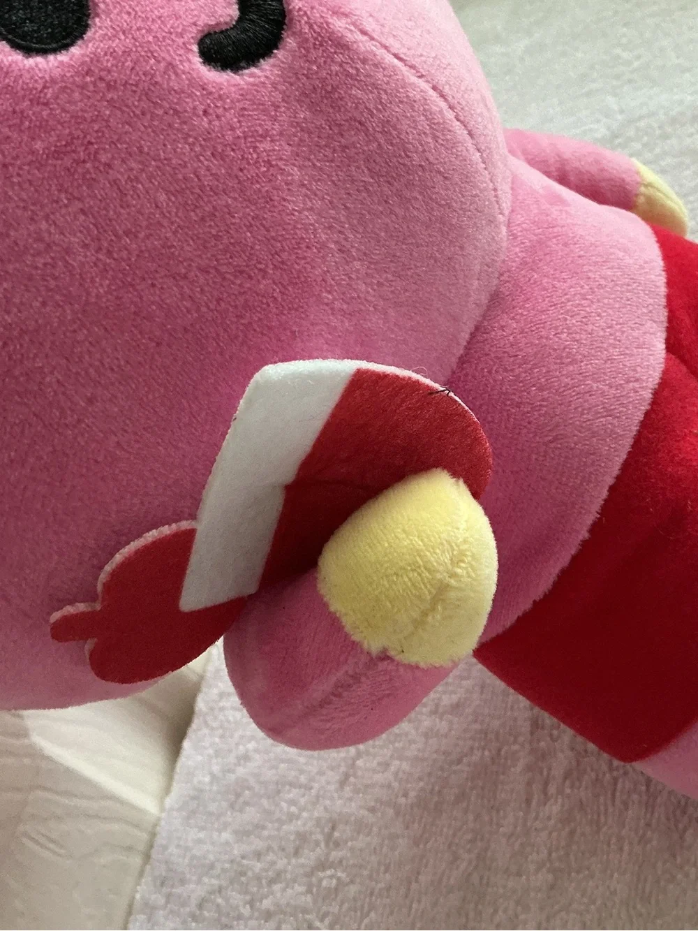 Bright Pink Plush Bunny Character Toy with Red Shorts